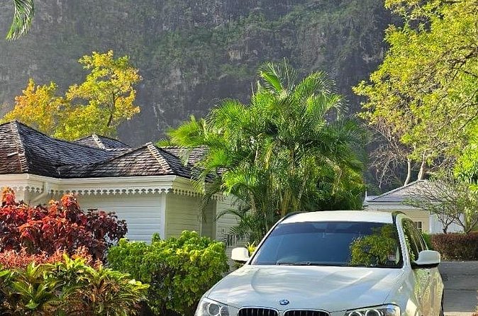 Airport Transfer to Secrets Resort and Spa (Round Trip) - Bottled water, local beer, and a friendly welcome