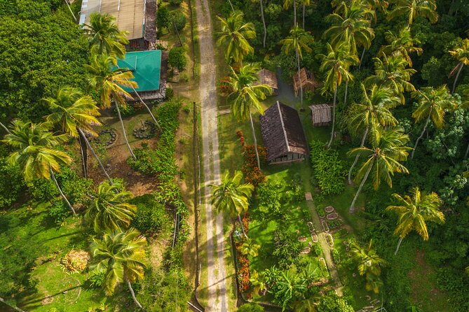 Historical 18th Century Estate Tour with Coconut Tasting - The replica village explains daily life