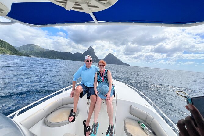 Private Boat Charter St. Lucia, boat tour to Soufriere. Full day - Anse Chastanet finishes with black sand and reef time