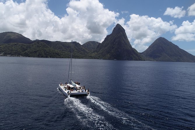 Private Catamaran Sunset Cruise from St Lucia for Up to 15 Guests - Rum punch, nonalcoholic drinks, and simple snacks