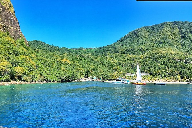 Private Custom Coastal Cruise St. Lucia Full Day - Snorkeling, fishing, and dolphin watching