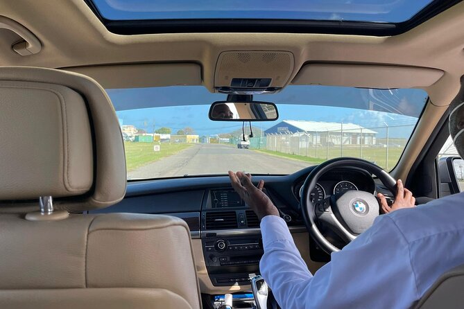 Private Luxury Hewanorra International Airport Transfer | UVF | Round-trip| - Meeting Your Chauffeur at Hewanorra Airport