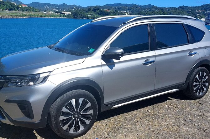 Private St Lucia Airport Transfer to Windjammer Landing Resort - Meeting your driver at the airport