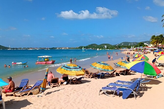 St. Lucia Beach Day with Paradise Beach Comforts & Transportation - Four hours at Reduit Beach