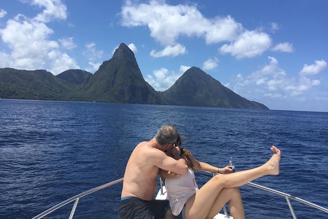St. Lucia Private Boat Tour, Mud Bath, Waterfall & Beach Time - Coastal views, film locations, and Marigot Bay