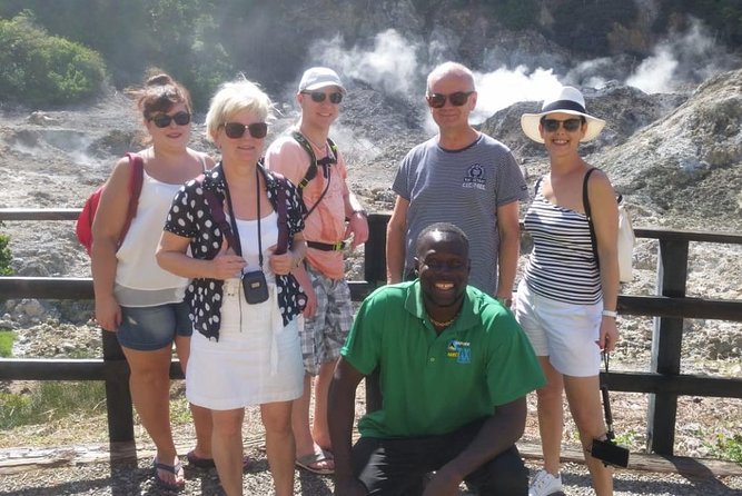 Trip to Soufiere: Volcano, Twin Pitons, Waterfall, Mud Bath & Botanical Garden - Starting above Castries with a view of the island